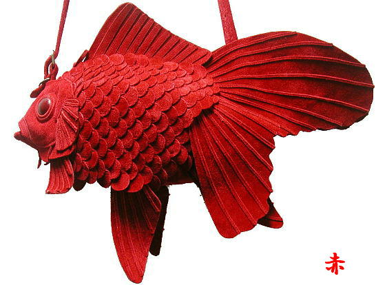 we-can-t-stop-staring-at-these-otherworldly-goldfish-bags