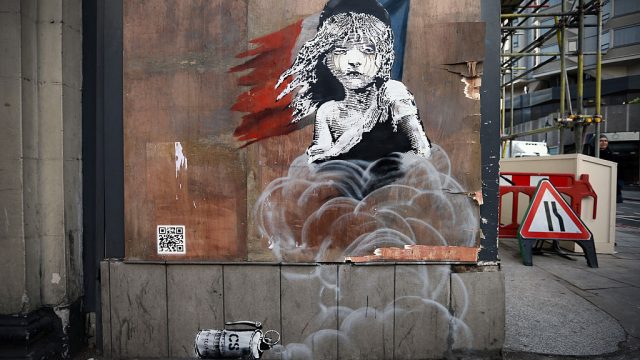 A New Banksy Appears Protesting Over The Use Of Teargas On Migrants In Calais
