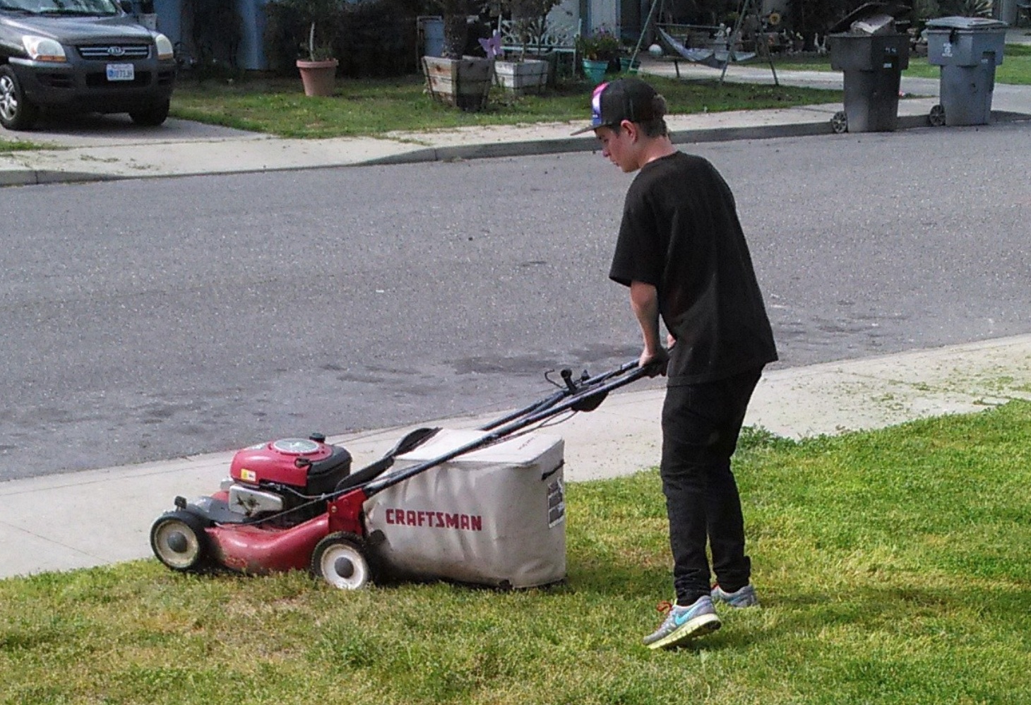 This 14 year old is melting hearts because he spent the day mowing