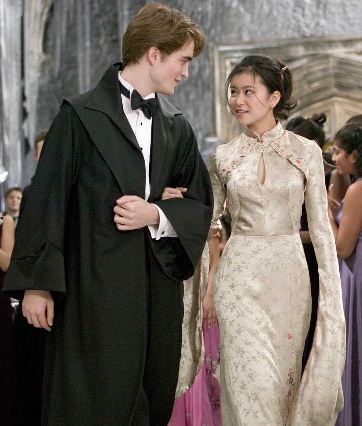 ROBERT PATTINSON as Cedric Diggory and KATIE LEUNG as Cho Chang in Warner Bros. Pictures’ fantasy “Harry Potter and the Goblet of Fire.”                     PHOTOGRAPHS TO BE USED SOLELY FOR ADVERTISING, PROMOTION, PUBLICITY OR REVIEWS OF THIS SPECIFIC MOTION PICTURE AND TO REMAIN THE PROPERTY OF THE STUDIO. NOT FOR SALE OR REDISTRIBUTION.