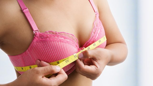 Woman wearing a badly fitting, too small bra, Stock Photo, Picture