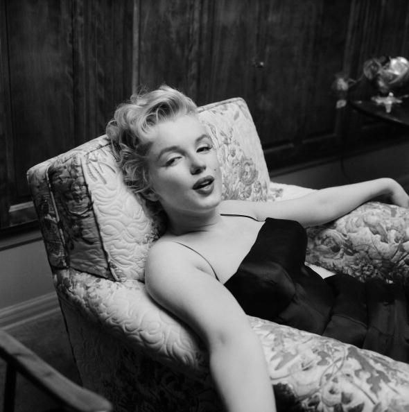 LOS ANGELES - MARCH 3:  Movie star Marilyn Monroe relaxes for a moment during a press party held at her home on March 3, 1956 in Los Angeles, California. (Photo by Earl Leaf/Michael Ochs Archives/Getty Images)
