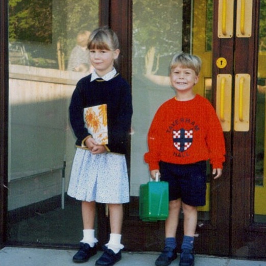 Me (left), around age 5 or 6, in my school's summer uniform