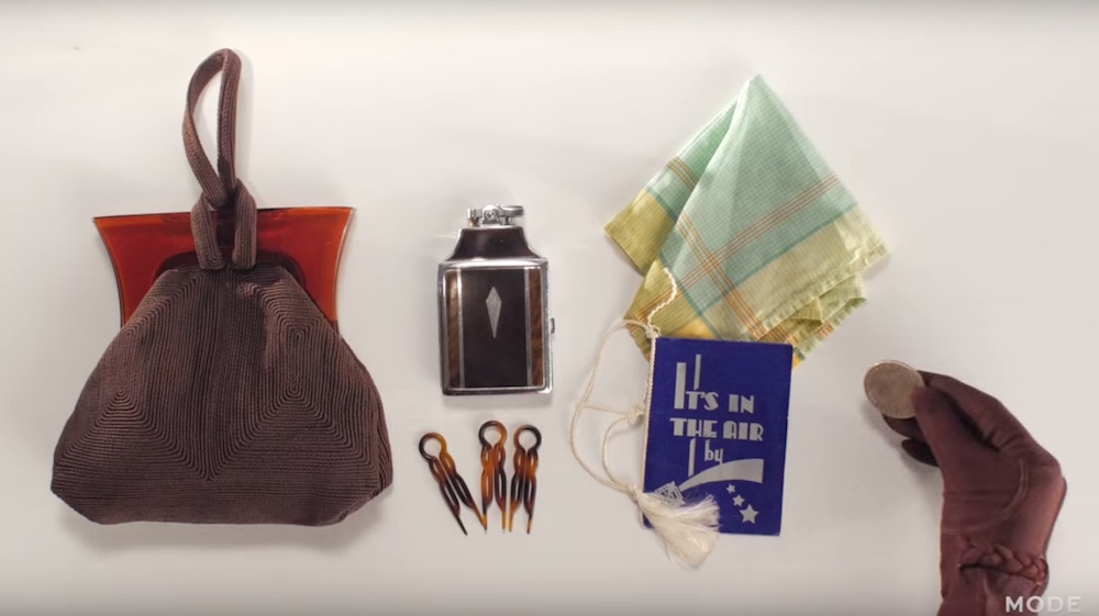 This 100 years of handbags vid shows what we carried in our purses