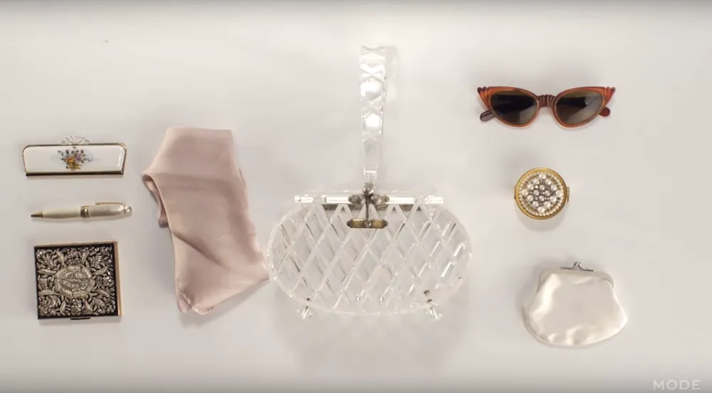 This 100 years of handbags vid shows what we carried in our purses