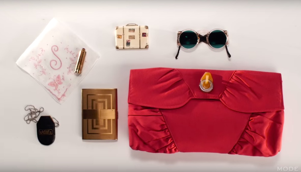 This 100 years of handbags vid shows what we carried in our purses