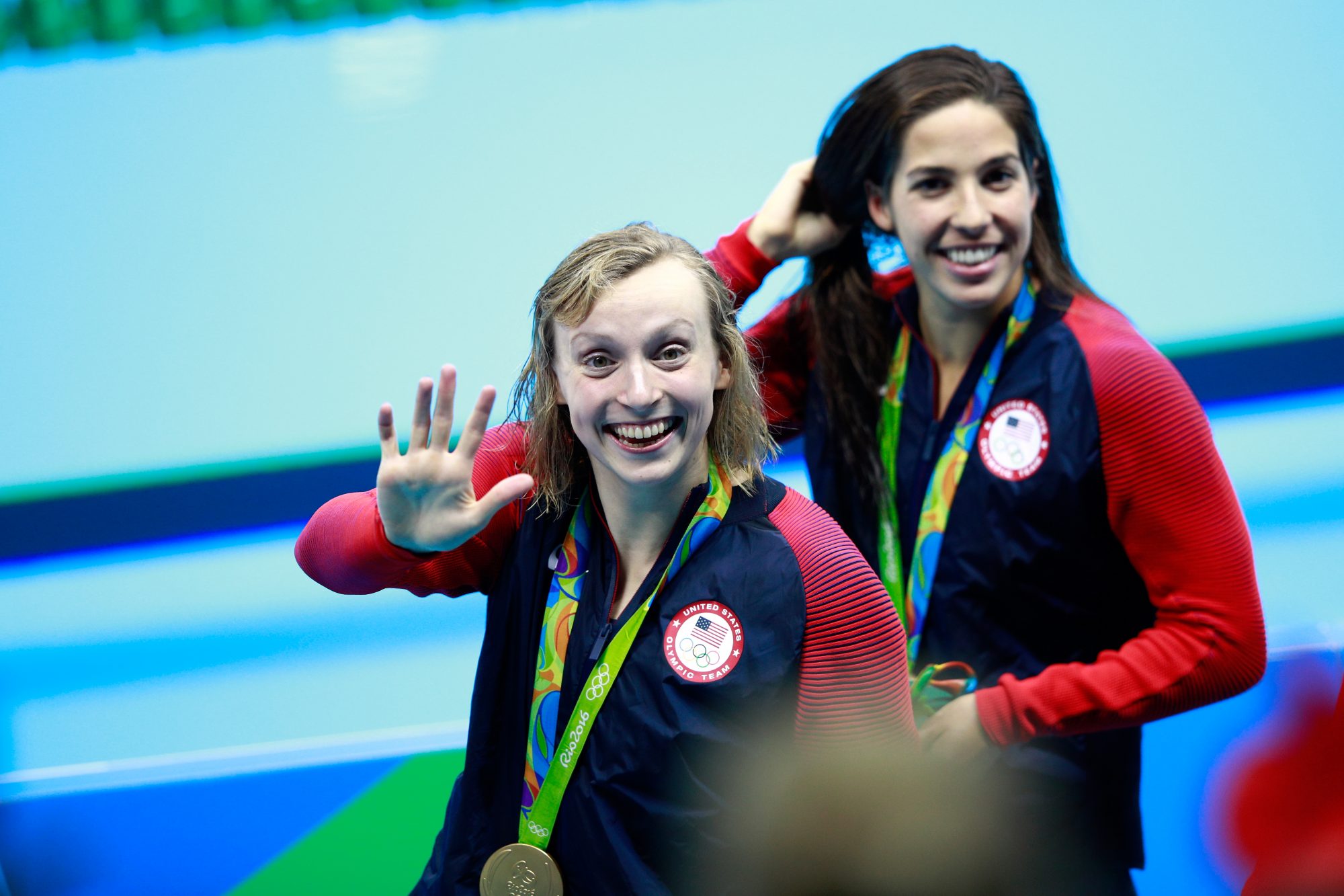 A Young Katie Ledecky Posed for Photos with Michael Jordan and