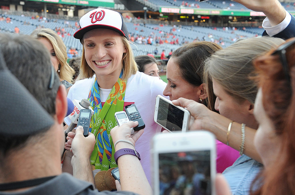 Katie Ledecky asked Bryce Harper to babysit her medals while she