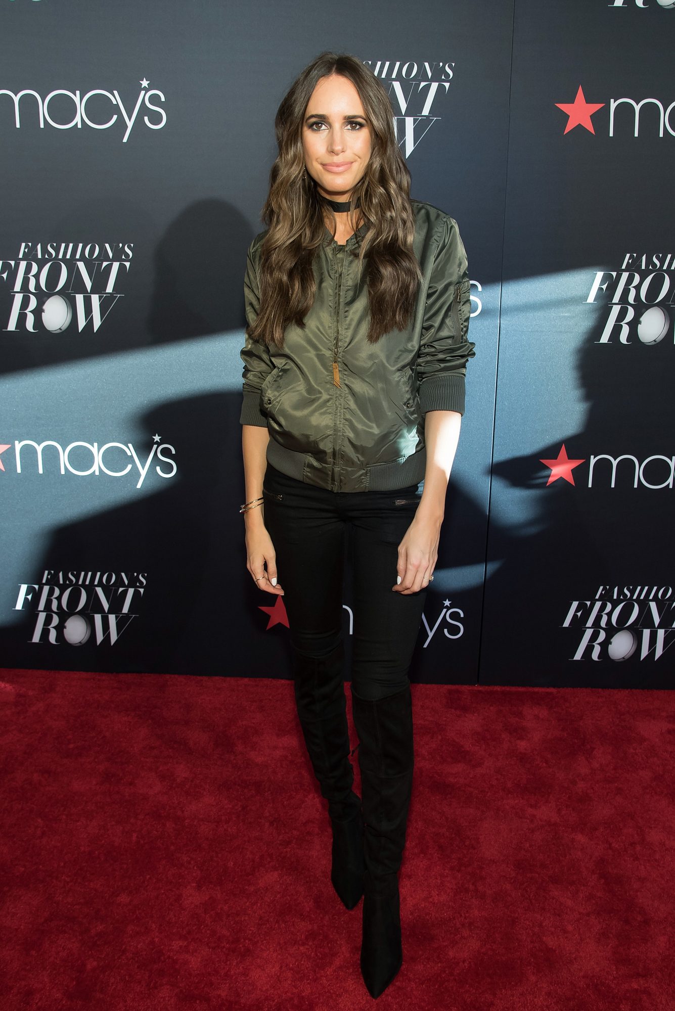 Louise Roe wearing the patent leather boots trend at NYFW 1