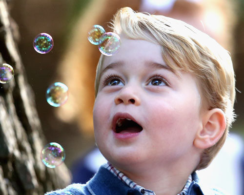 prince-george-looking-at-bubbles.jpg