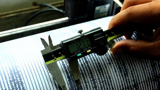 Officer checked and seismic activity detector (seismograph)