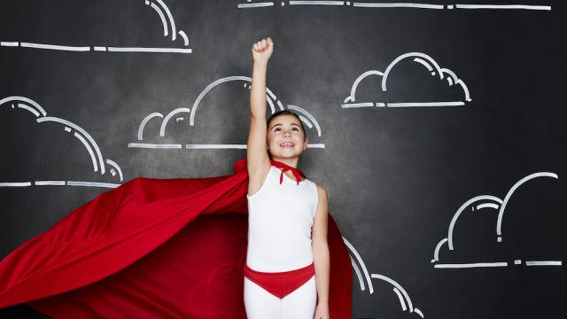 Portrait of girl dressed as a superhero