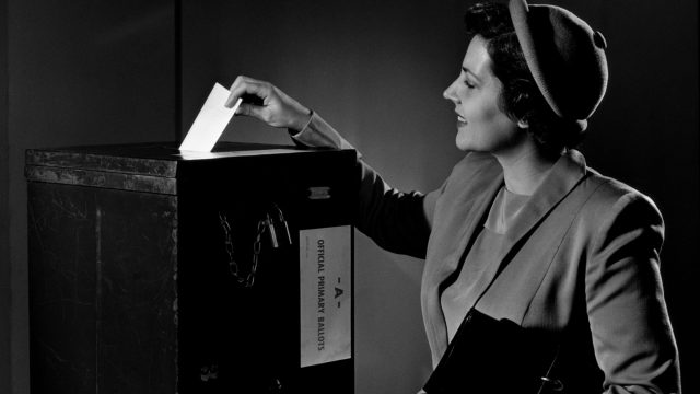 WOMAN VOTING IN THE 1950S