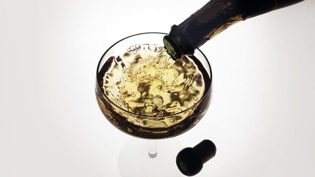 Pouring A Glass Of Sparkling Wine