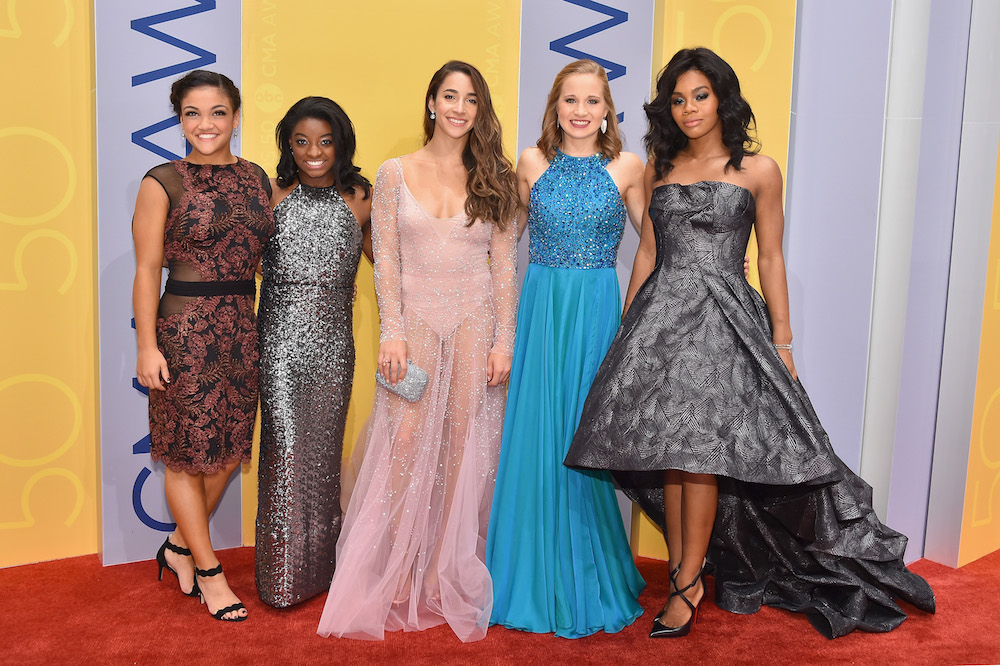 NASHVILLE, TN - NOVEMBER 02: (L-R) Olympic gymnasts Laurie Hernandez, Simone Biles, Aly Raisman, Madison Kocian, and Gabby Douglas attend the 50th annual CMA Awards at the Bridgestone Arena on November 2, 2016 in Nashville, Tennessee.  (Photo by Michael Loccisano/Getty Images)