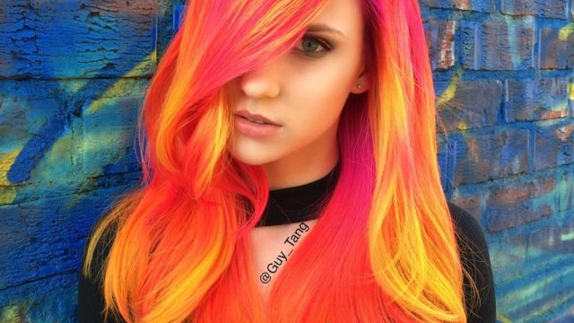 The latest glow-in-the-dark hair dye trend will make you look like you just  stepped out of a blacklight poster - HelloGigglesHelloGiggles