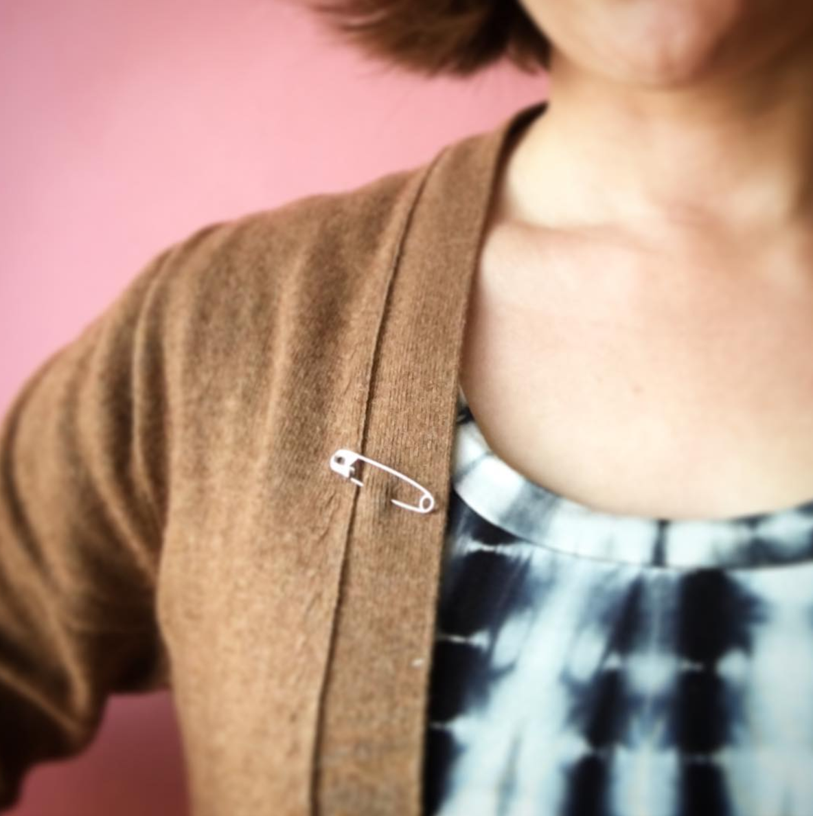 Here's the powerful reason people are wearing safety pins on their