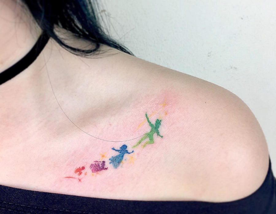 tinkerbell silhouette tattoo behind ear