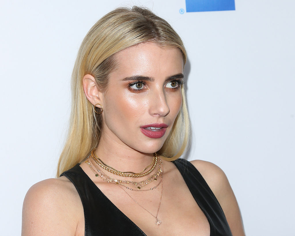 Emma Roberts grabs coffee with a friend while rocking her controversial Moschino  pill pack handbag