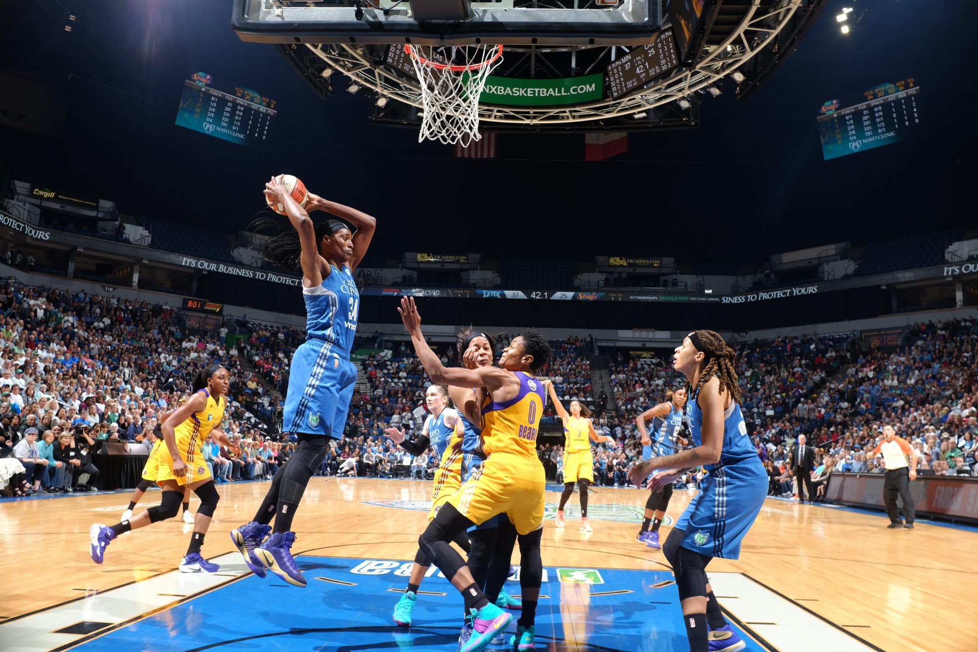 MINNEAPOLIS, MN - OCTOBER 11:  Sylvia Fowles #34 of the Minnesota Lynx grabs the rebound against the Los Angeles Sparks during Game Two of the 2016 WNBA Finals on October 11, 2016 at Target Center in Minneapolis, Minnesota. NOTE TO USER: User expressly acknowledges and agrees that, by downloading and or using this Photograph, user is consenting to the terms and conditions of the Getty Images License Agreement. Mandatory Copyright Notice: Copyright 2016 NBAE (Photo by David Sherman/NBAE via Getty Images)