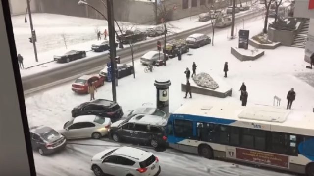 montreal-bus-hits-car-snow
