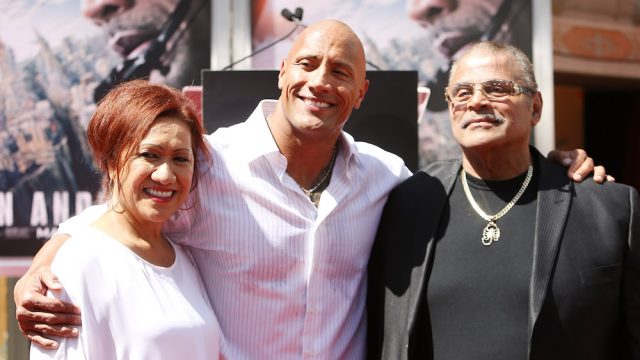 Dwayne "The Rock" Johnson and his parents.
