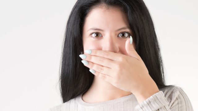 hand covering mouth