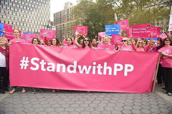 Activists hold Planned Parenthood banner in Foley Square.
