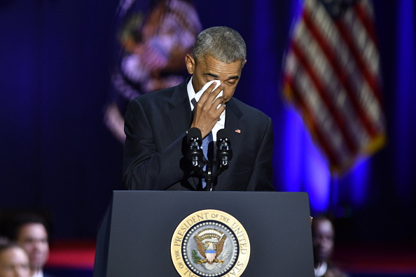U.S. President Barack Obama wipes his tears while speaking about U.S. First Lady Michelle Obama, not pictured, during his farewell address in Chicago, Illinois, U.S., on Tuesday, Jan. 10, 2017. Obama blasted