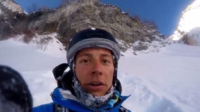 guy-skis-off-cliff