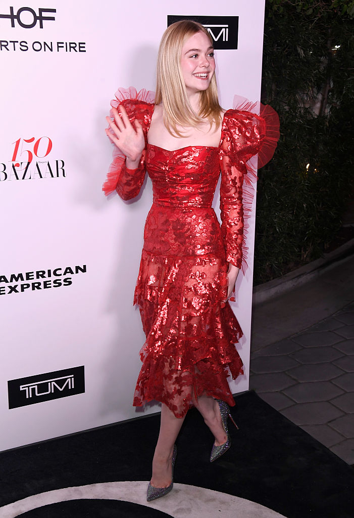 Elle Fanning's fluffy red dress looks like a heart, and is giving us tubular '80s vibes - HelloGigglesHelloGiggles