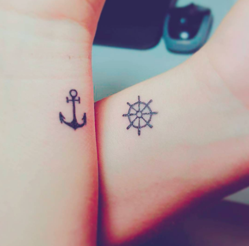 Man and Woman Interlocking Index Fingers With Anchor Tattoos · Free Stock  Photo