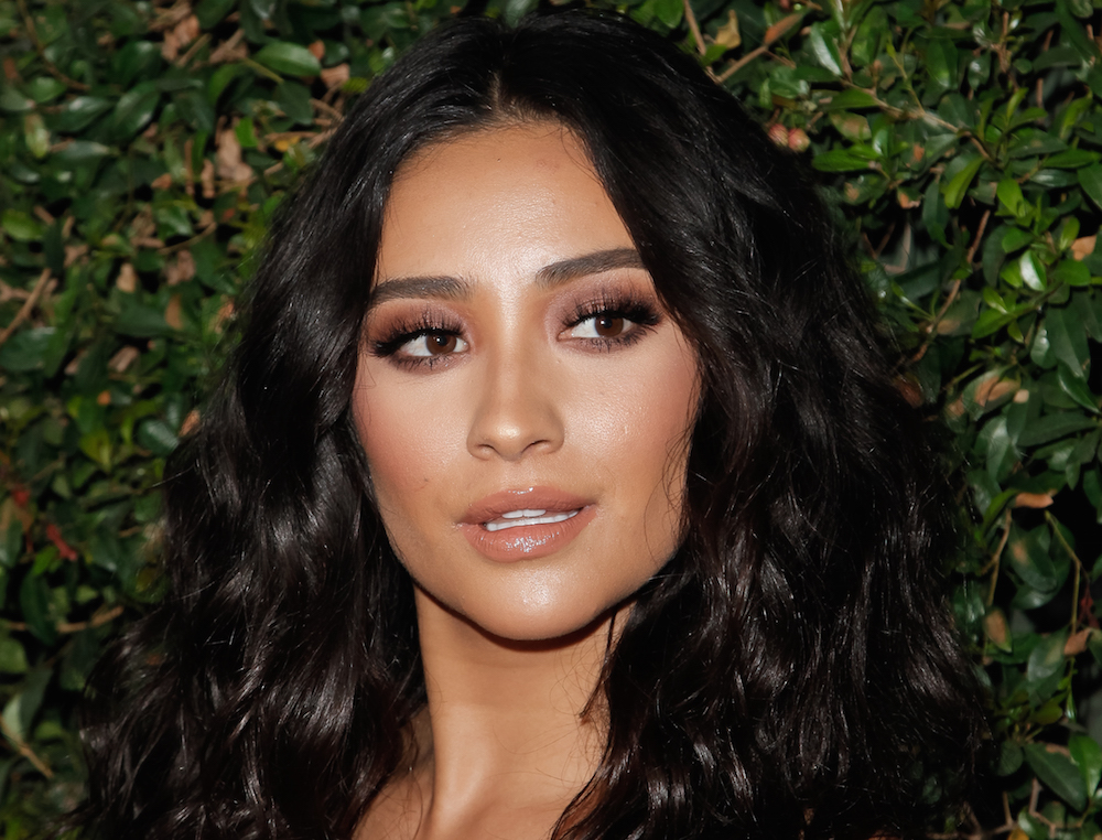 Shay Mitchell's millennial take on the pantsuit is business meets sexy ...