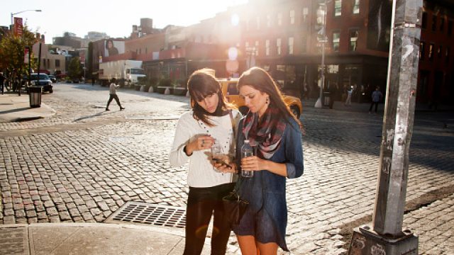 friends looking at map