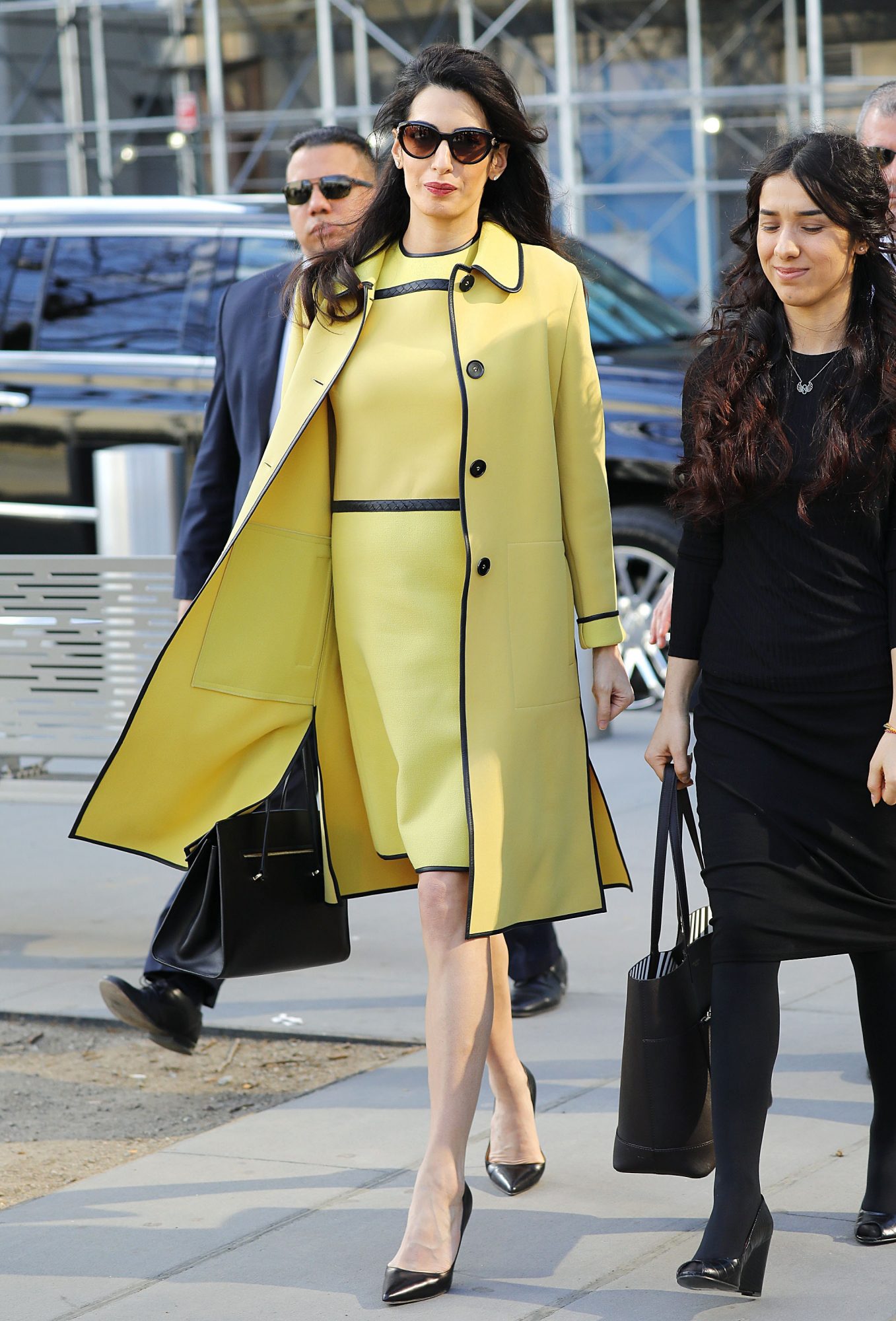 Amal Clooney s yellow coat and dress are oh so Jackie O