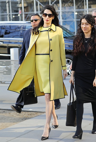 Amal Clooney has been wearing one timeless coat style in so many ...