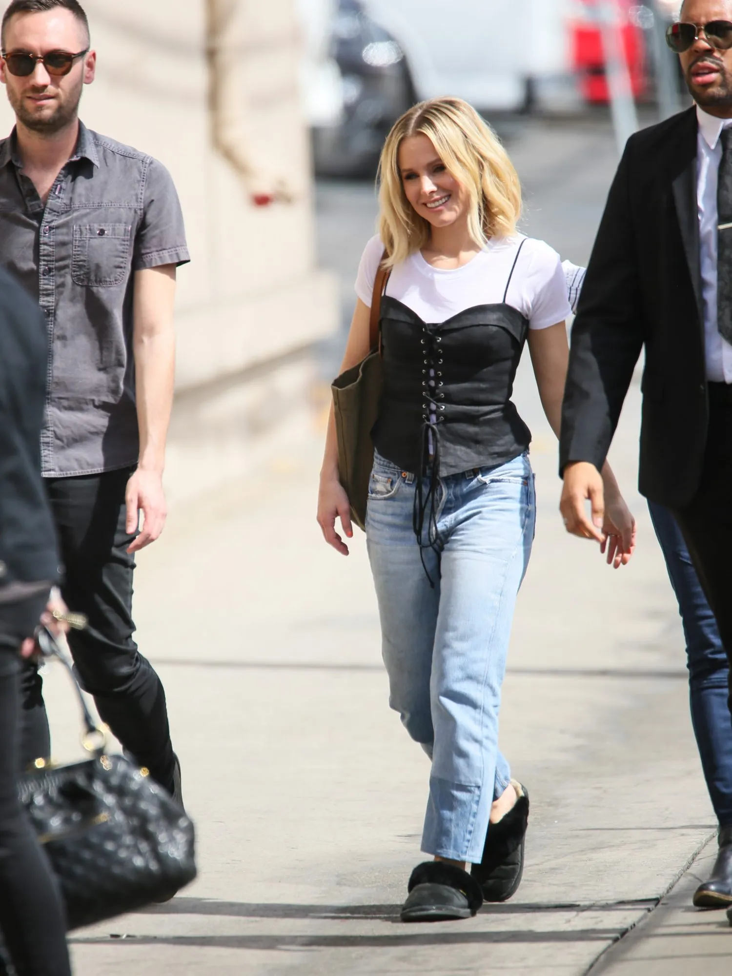 If anyone can pull off slippers, jeans, and a corset — it's Kristen Bell -  HelloGigglesHelloGiggles