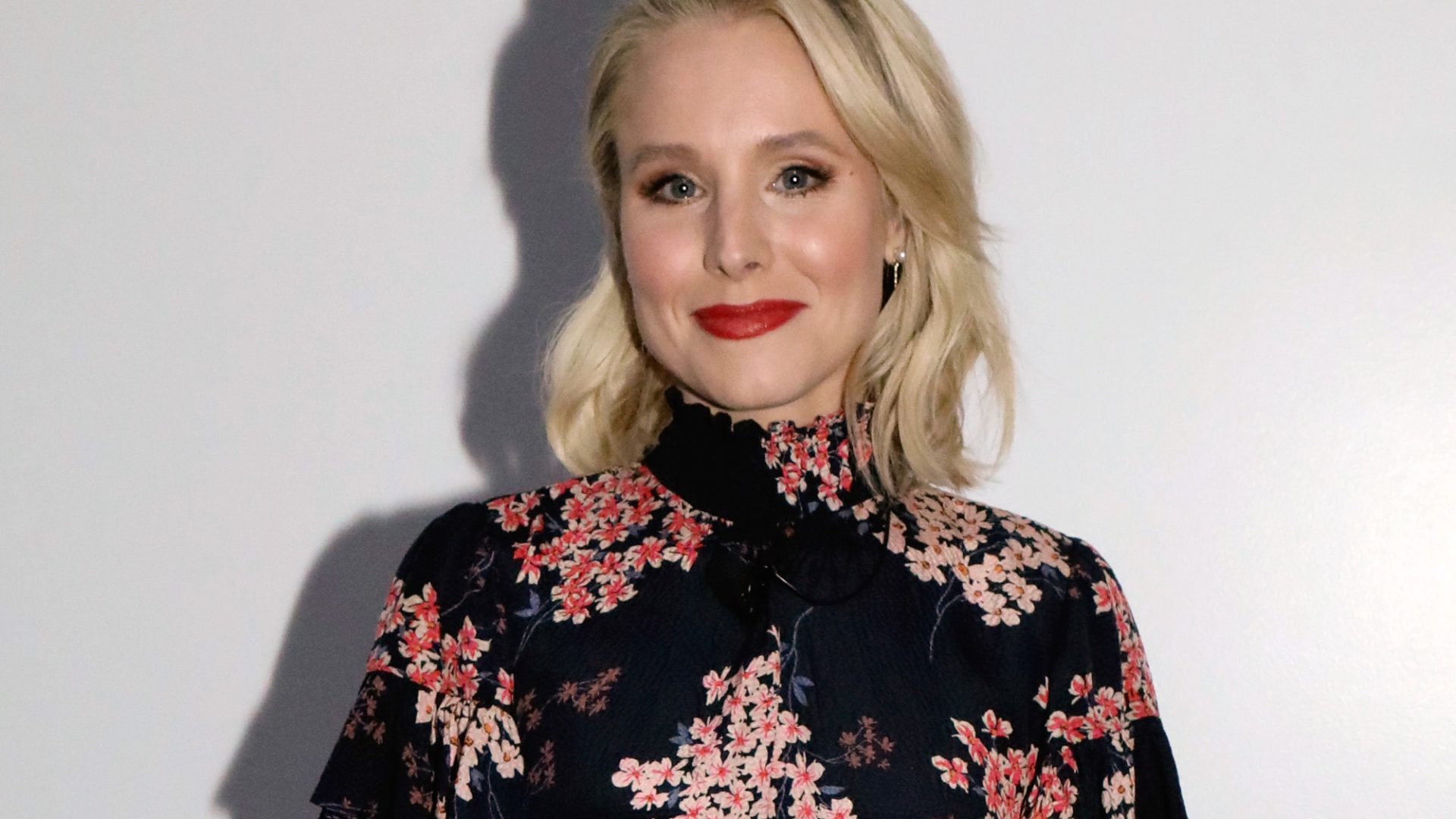 Kristen Bell shows us how to pair goth floral with tights — here's how