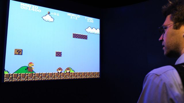 guy plays super mario bros.