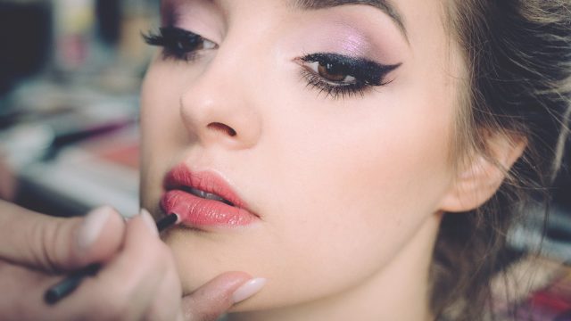 putting-on-makeup