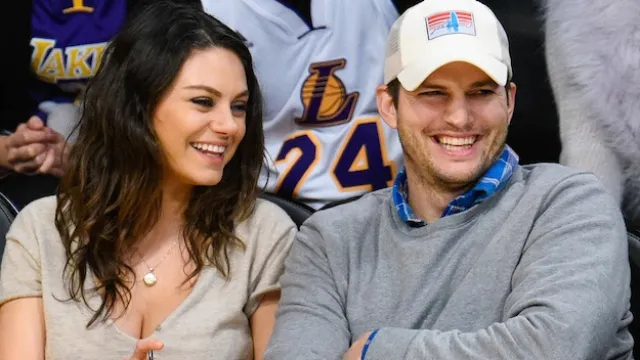 Ashton Kutcher and Mila Kunis at Basketball