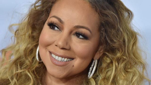 mariah carey closeup smiling hoop earrings