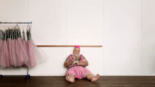 Tattooed man in tutu