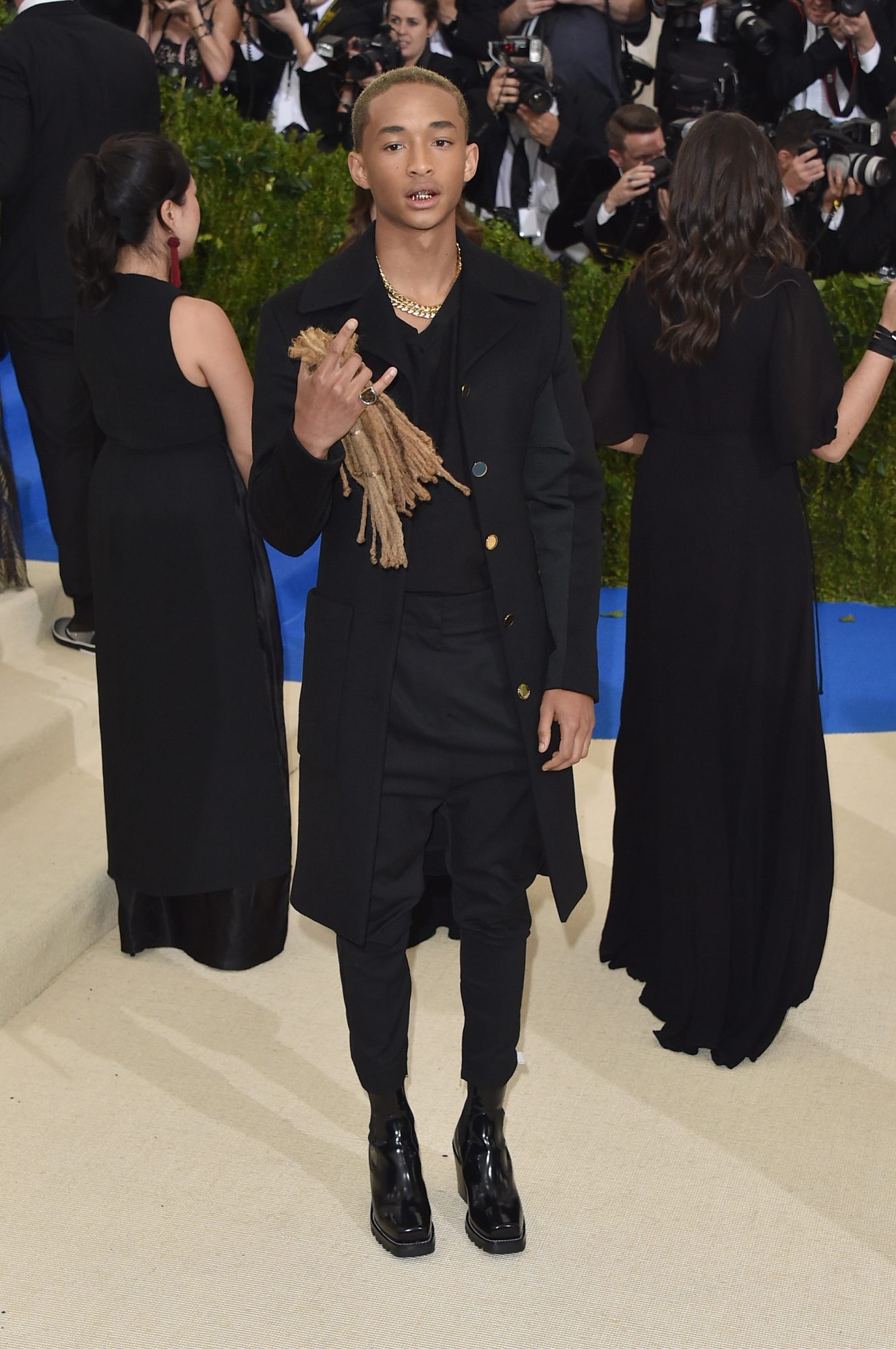 Jaden Smith with cut hair in hand at 2017 MET Gala