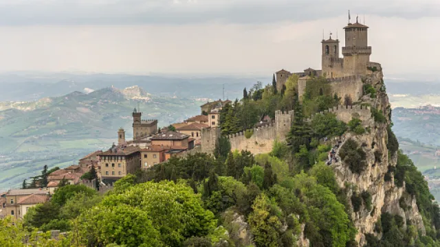 castle on a cliffside in Italy