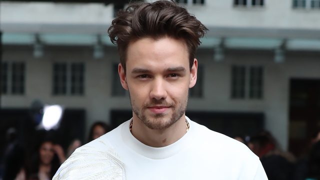 Liam Payne outside BBC Radio 1 wearing a white sweater