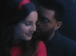 Lana Del Rey and the Weeknd in the "Lust for Life" video.