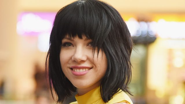 Carly Rae Jepsen wearing a yellow dress