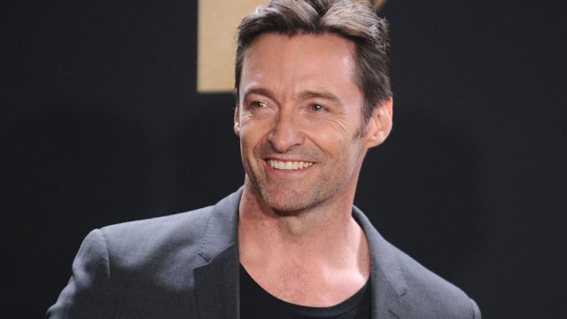 Hugh Jackman in a blazer and t-shirt at the MTV Movie Awards.