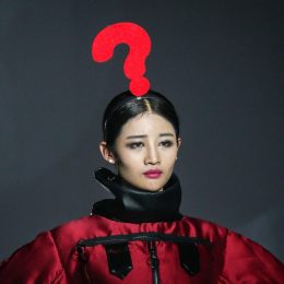 A model wears a giant question mark on her head on the runway during Wuhan Fashion Art Festival in China.